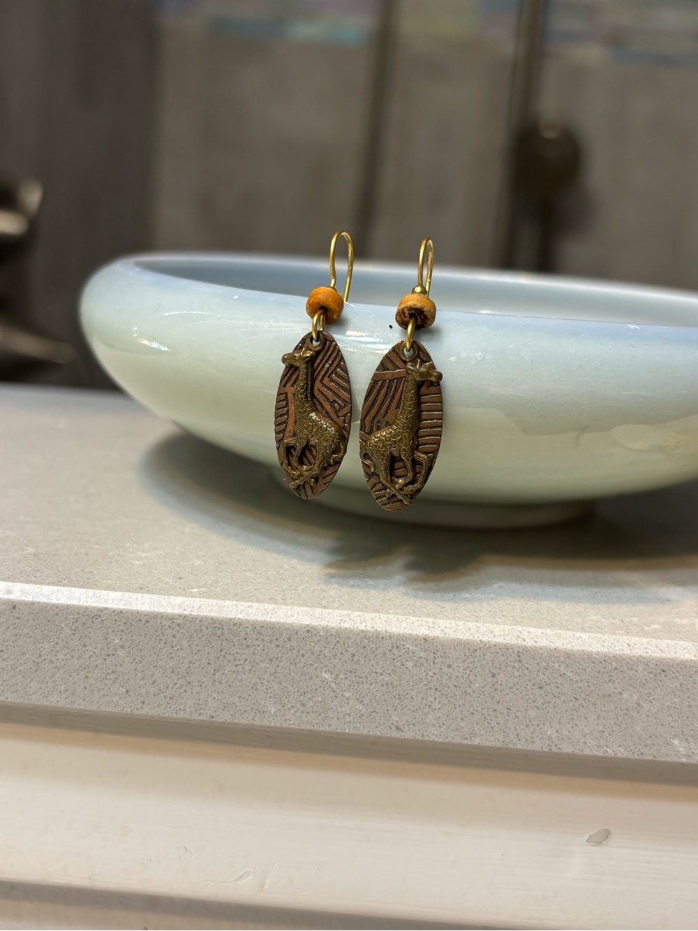 Silver Forest Bronze Animal Motif Drop Earrings with Tan Beads